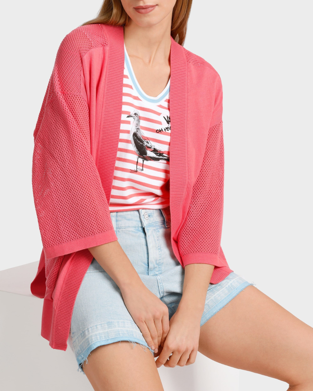 Cardigan with perforated insert